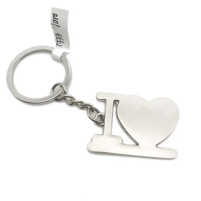 Disponible OEM/ODM Portador de llaveros de metal para el corazón con paquete individual