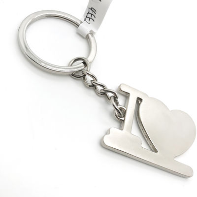 Disponible OEM/ODM Portador de llaveros de metal para el corazón con paquete individual