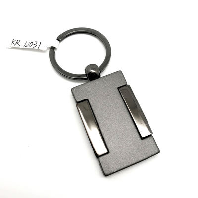 MOQ 500 Color de pistola negra Portador de llavero de metal con logotipo personalizado para