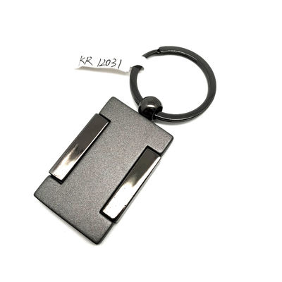 MOQ 500 Color de pistola negra Portador de llavero de metal con logotipo personalizado para