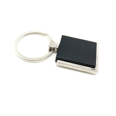Silencio de metal negro porta llavero disponible para la compra en línea
