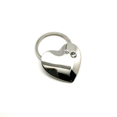 Portador de llavero de metal de plata con logotipo personalizado en bolso individual
