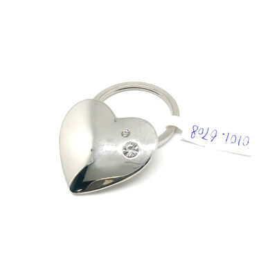 Logotipo en relieve encantador llave de metal encantador / anillo de llave lindo regalo personalizado recuerdo de hueso de forma de soporte