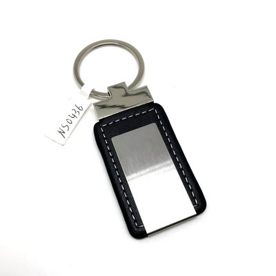 Buen precio Portador de llavero de cuero clásico con patrón personalizado empaquetado en bolsa poli en línea