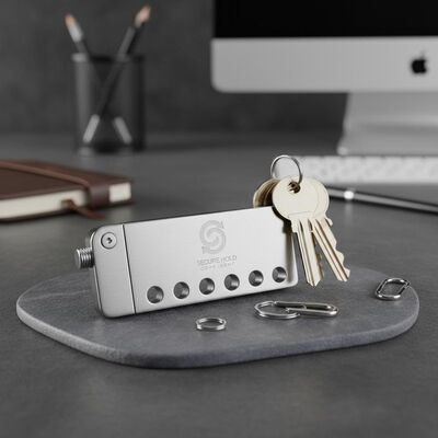 Buen precio Organizador de llavero de acero duradero con logotipo personalizado Ideal para mantener llaves seguras y mostrar la identidad corporativa en línea