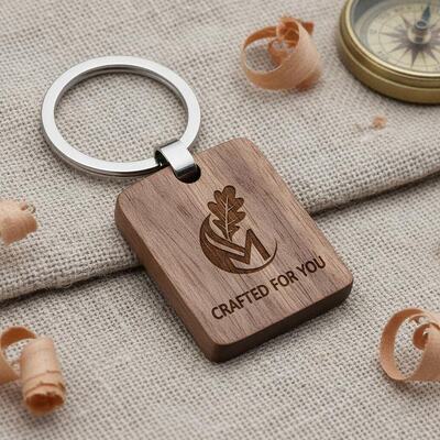 Buen precio Llavero de madera con logotipo personalizado, grabado, artesanía personalizable y llavero de Metal diseñado para un marketing único en línea