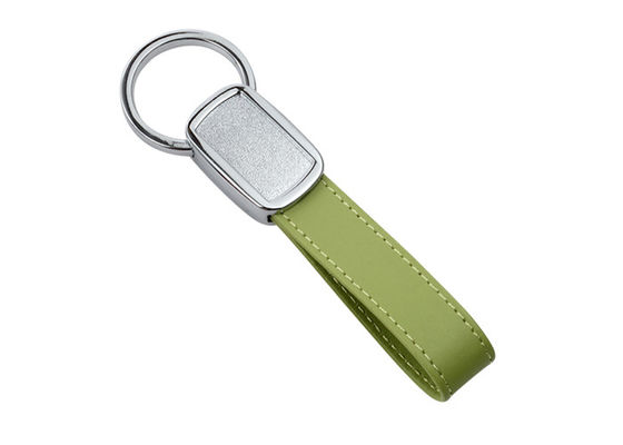 Buen precio Los llaveros de cuero de la PU del verde de la cinta de Debossing atan con correa cubrir con una cúpula de epoxy en línea