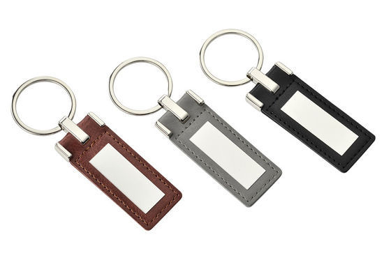 Buen precio El llavero de cuero de encargo promocional Debossing personalizó a Logo Zinc Alloy Material en línea